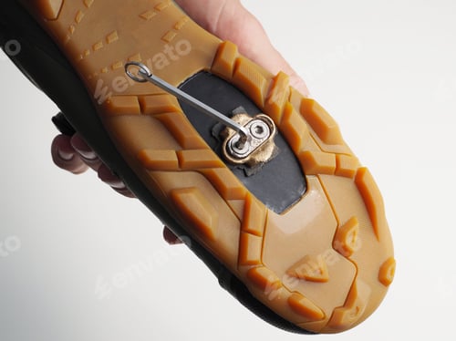 Preview: Close Up Shot. Man Installing Clipless Pedal To The Cycling Shoes.
