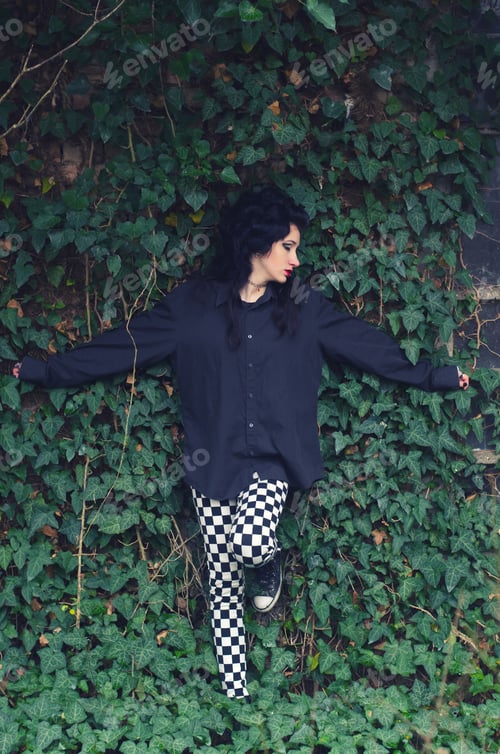 Preview: Beautiful Sad Lonely Goth Teenage Girl In Climber Plants In Autumn.