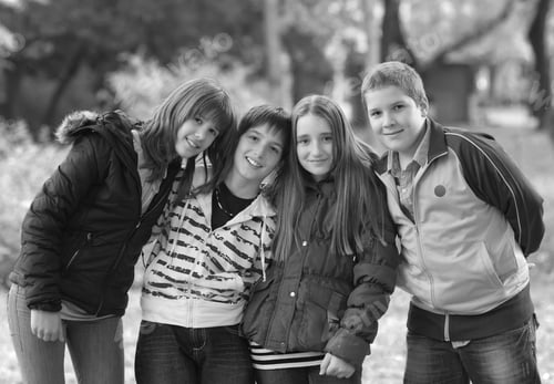 Preview: Teenage Boys And Girl Having Fun In Park In Spring.