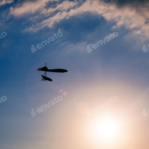 Preview: Hang-Glider Silhouette In Sky In Sunset Time