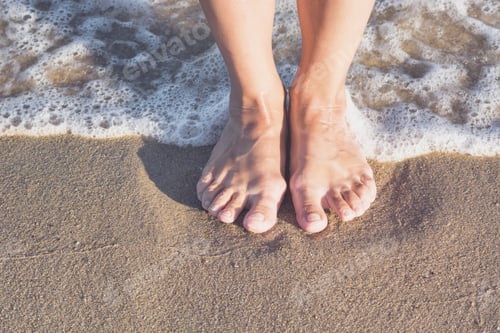 Preview: Woman'S Legs On The Sand Beach And Sea Waves At Sunset.