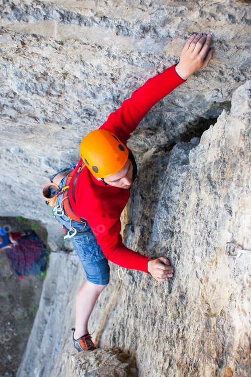 Preview: Climber In A Helmet Climbs To The Top Of The Mountain. Sport Activities In Nature.