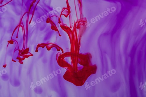 Preview: Red And Violet Liquid In Water Making Abstract Form