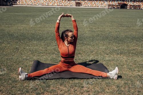 Preview: Portrait Of One Sports Fitness Girl Dressed Fashion Sportswear Outfit Doing Stretches Exercise And