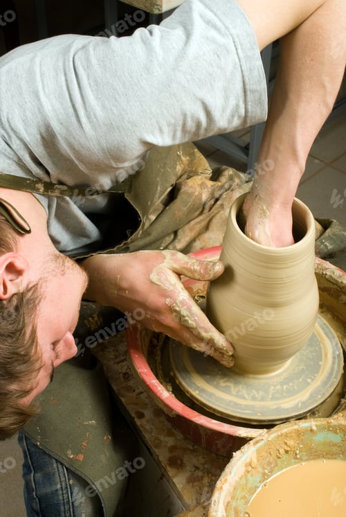 Preview: Potter, Creating An Earthen Jar Of White Clay