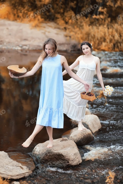 Preview: Beautiful Young Girls In Dresses Cross The Creek In Autumn