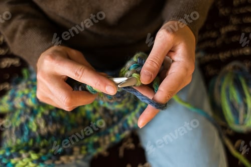 Preview: Close Up of Knitting Project with Blue Yarn