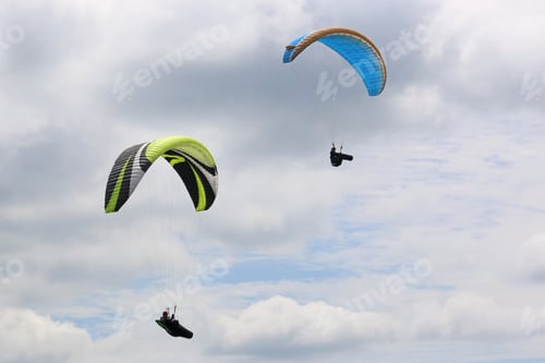 Preview: Paragliders In A Cloudy Sky
