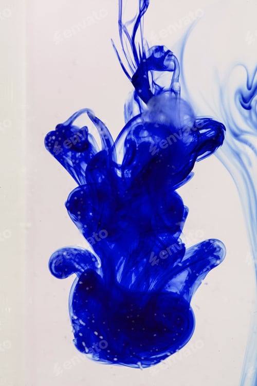Preview: Blue Ink Liquid In Water Making Abstract Forms