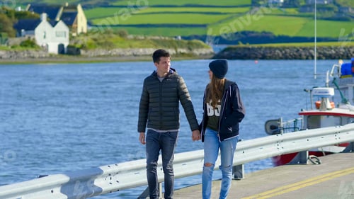 Preview: Young Couple Walks Hand In Hand Through The Harbor