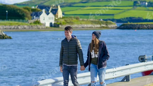 Preview: Young Couple Walks Hand In Hand Through The Harbor