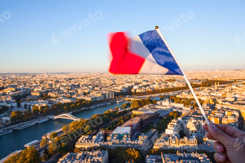 Preview: The Flag Of France Over The Paris City Top View From Eiffel Tower At Sunset Time