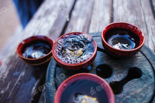 Preview: Set For Tea Ceremony. Tea Pours From A Teapot Into A Cup. The Art Of The East. Tea Tradition.