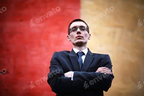 Preview: A Man In A Suit Lies On A Brick Floor Outdoor