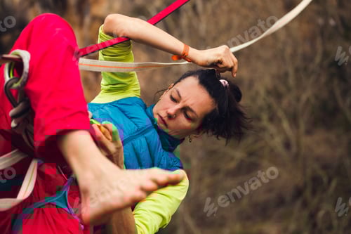 Preview: A Woman Tries To Climb The Highline. Highliner Close Up. Fall Athlete. Safety And Safety System In