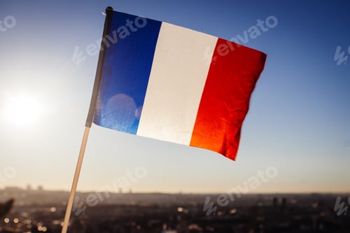 Preview: The Flag Of France On Background Of The View Of Paris From Sacre Coeur Basilica In France In Sunset