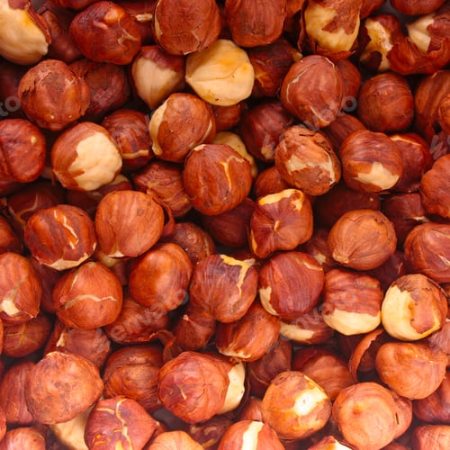 Pile of shelled hazelnuts on display