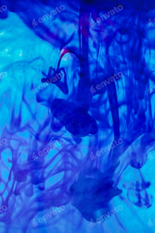 Preview: Blue Liquid In Water Making Abstract Forms