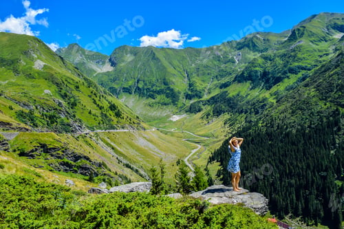 Preview: Girl On The Cliff Edge Near Transfegerasan Mountain Road.