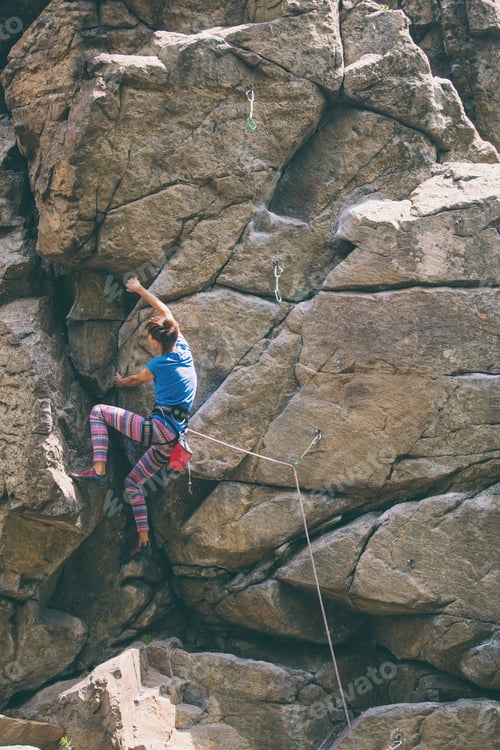 Preview: The Girl Climbs The Granite Rock. Rock Climber Trains On Natural Terrain. Extreme Hobby.