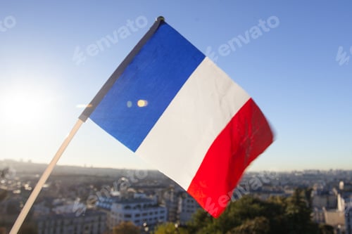 Preview: The Flag Of France On Background Of The View Of Paris From Sacre Coeur Basilica In France In Sunset