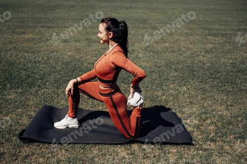 Preview: Portrait Of One Sports Fitness Girl Dressed Fashion Sportswear Outfit Doing Stretches Exercise And