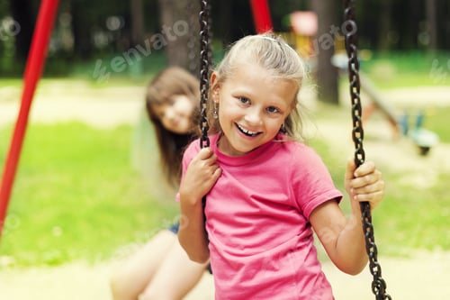 Preview: Happy Little Girl On Swing