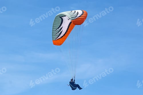 Preview: Paraglider Flying Wing In A Blue Sky