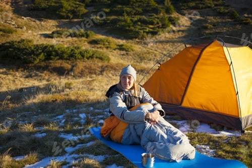 Preview: The Girl Basking In A Sleeping Bag At Dawn.