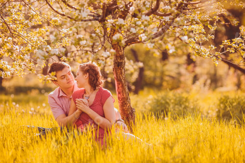 Preview: Portrait Of Young Couple In Flowering Park