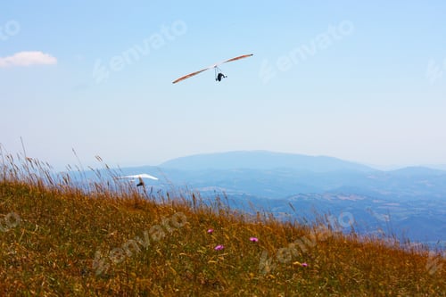 Preview: Hang Glider Pilot In Italian Mountains