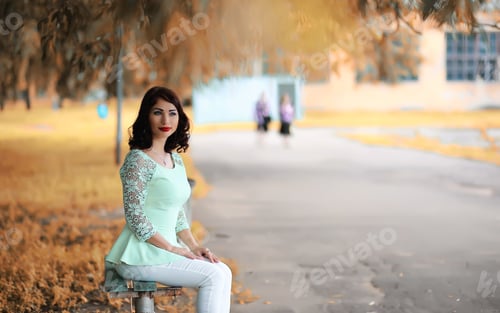 Preview: Beautiful Girl In A Autumn Deciduous Park In The Afternoon