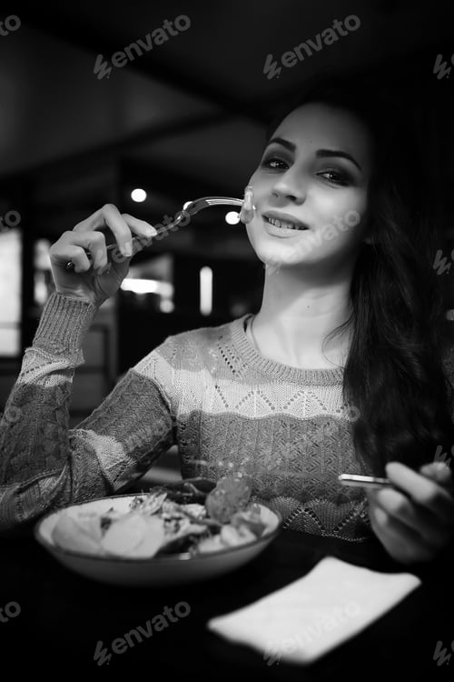 Preview: Beautiful Girl In A Cafe Having A Cup Of Coffee At A Dinner