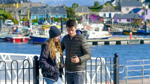Preview: Young Couple Takes A Selfie At The Harbor Of Dingle