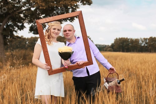 Preview: Just Married Lovers Walking In Field In Autumn Day