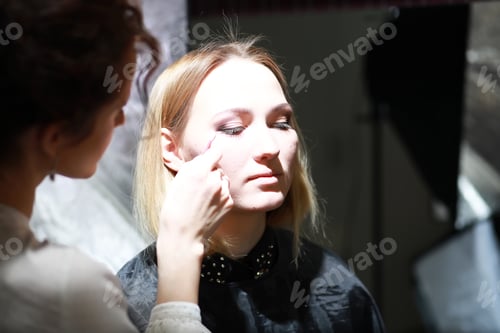 Preview: Young Girl With A Make-Up Artist In The Studio In Front Of A Mirror