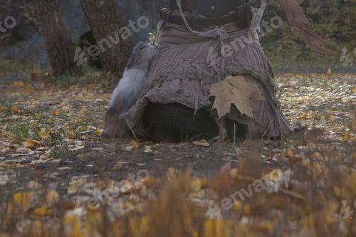 Preview: Beautiful Woman Dressed Boho Style Sitting On The Autumn Leafes