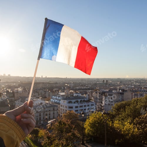 Preview: The Flag Of France On Background Of The View Of Paris From Sacre Coeur Basilica In France In Sunset