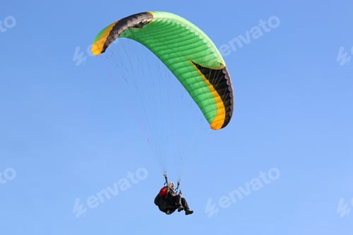 Preview: Paraglider In A Blue Sky