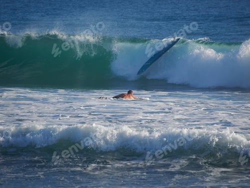 Preview: Surfer In Front Of A Big Wave