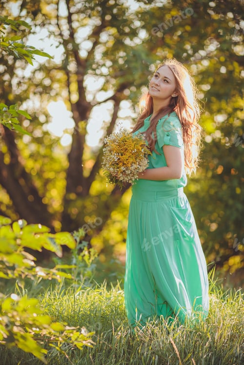 Preview: Artistic Portrait Of Young Gorgeous Brunette On Green Meadow. Shallow Depth Of Field