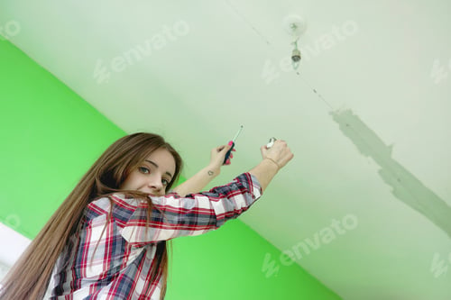 Preview: The Builder Makes Repairs In Apartment. Finishing Works On Plastering And Painting Of Walls