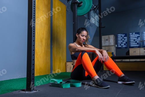 Preview: Beautiful Exhausted Girl Sitting At The Gym