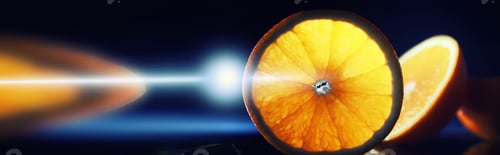 Preview: Composition With Orange And Grapefruit Slices On A Black Background. A Slice Of Orange On A Black