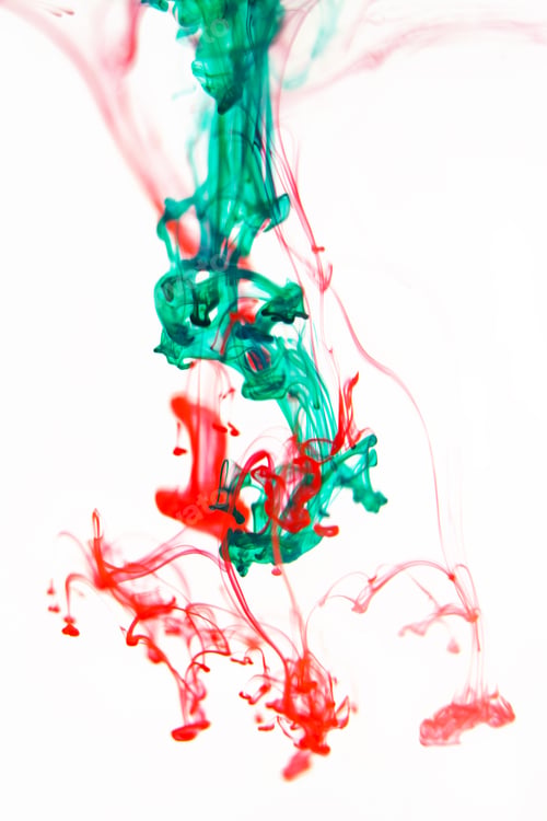 Preview: Red And Green Liquid In Water Making Abstract Forms