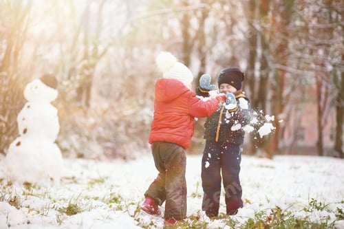 Preview: Children In Winter Park Play With Snow