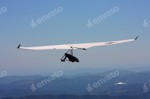 Preview: Hang Glider Pilot In Italian Mountains