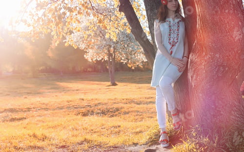 Preview: A Girl On A Walk In An Autumn Park. Young Red-Haired Girl In The Spring Nature.