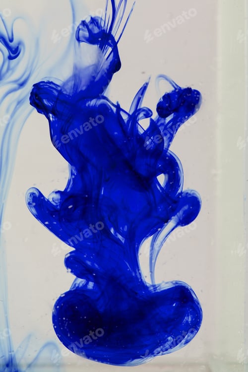 Preview: Blue Ink Liquid In Water Making Abstract Forms