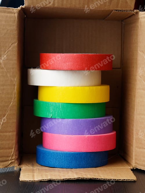 Preview: Rolls Of Colored Masking Tape In A Carton Box.
